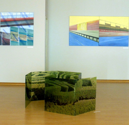 Art installation titled Labyrinth from 2018, consisting of 7 modules measuring 65x65 cm each, printed on plexiglass, by Danuta Krajewska-Pietrasik.